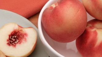 Poached peaches in cinnamon-ginger syrup