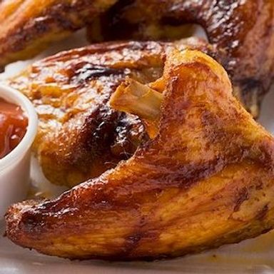 Big-batch baked chicken in chili sauce