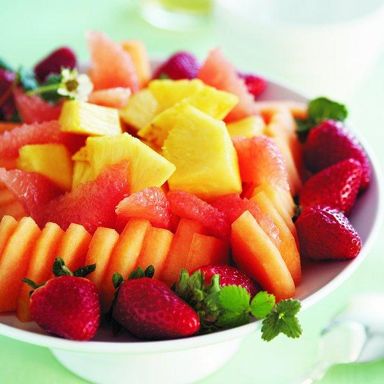 Fresh fruit medley with ginger-mint drizzle