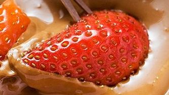 Three chocolate fondues with sensual fruit