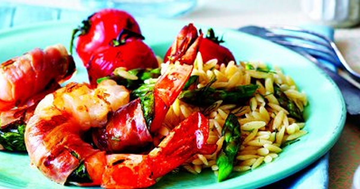 Prosciuttowrapped shrimp with grilledasparagus orzo Chatelaine