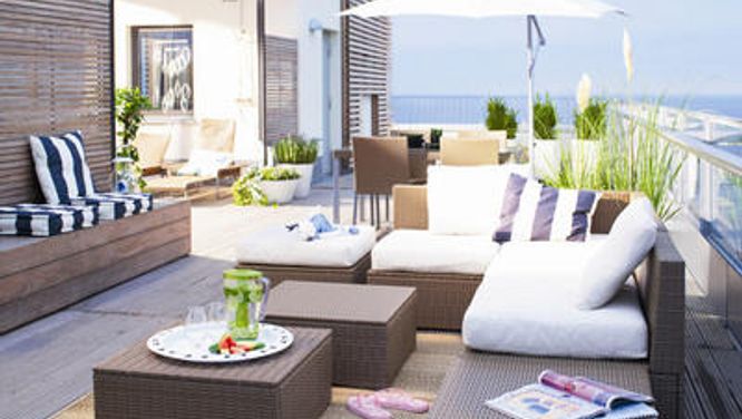 Ask Virginie: What's the best length for drapes? Should I reupholster or toss my old couch?