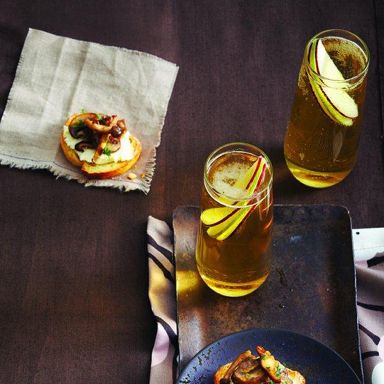 Lemony mushroom and herb crostini and an apple sparkler cocktail