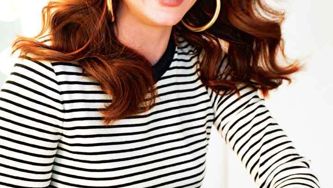 Debra Messing on being a mother, how she hit it big and her worst hair scares