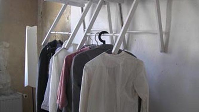 Cool storage idea with a folding chair!