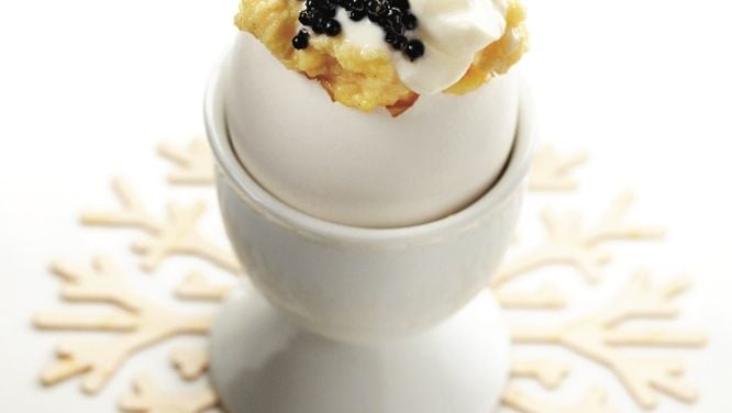 Soft and creamy eggs with caviar