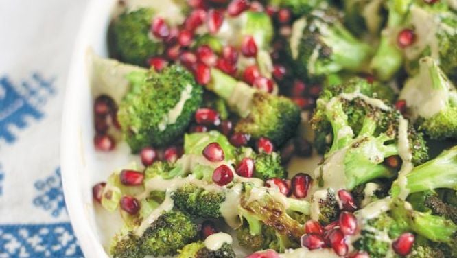 Roasted broccoli with pomegranate and tahini