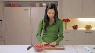 Easiest way to halve cherry tomatoes