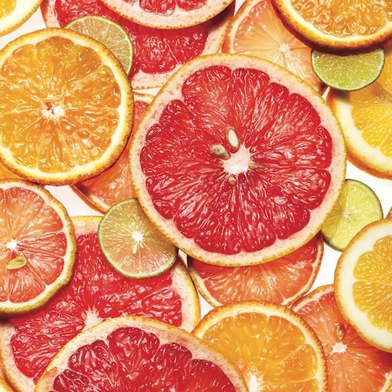 Sliced grapefruit, lemons, oranges and limes