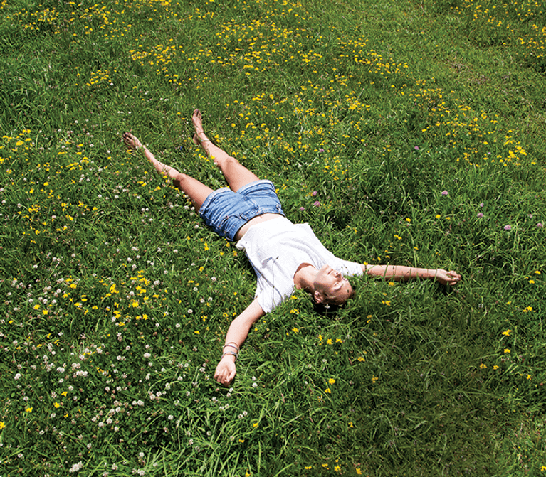 Woman lying under the sun