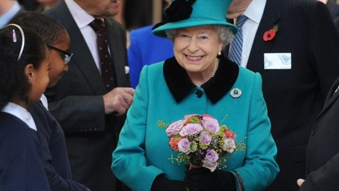 A peek inside the Queen's (many!) handbags — and their role in royal life