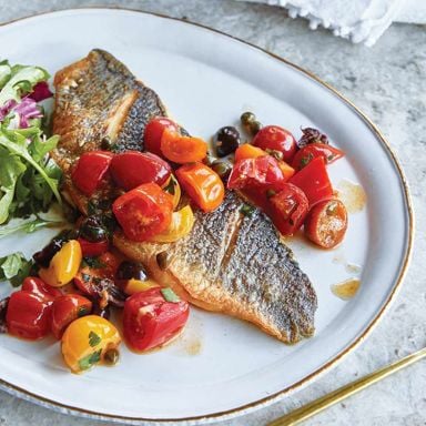Giada De Laurentiis' Pan-Seared Branzino With Tomato And Capers