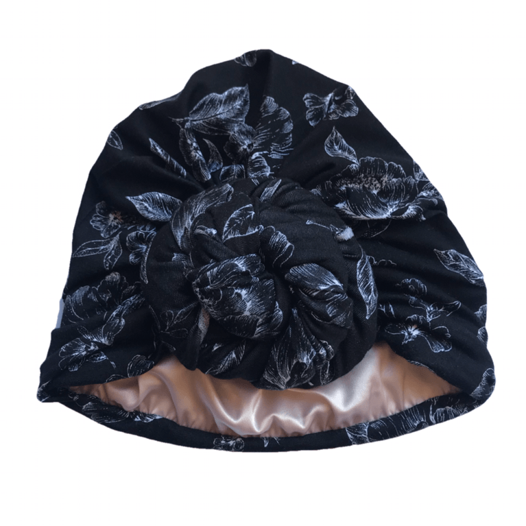 You Go Natural T-Shirt Front Bun Wrap in Black/White Floral, $46, yougonatural.com