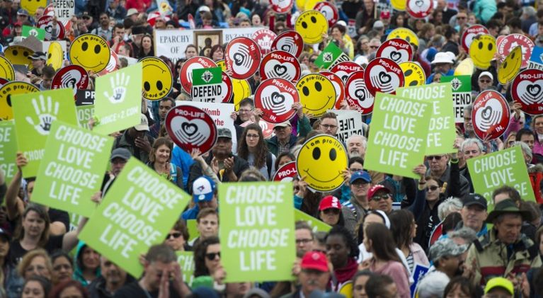 Canada anti-abortion movement-protesters with signs