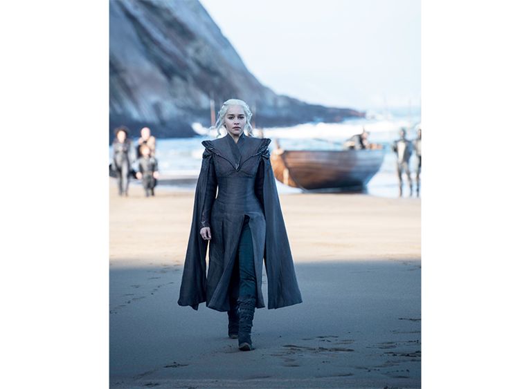 2019 TV spin-offs-Dragon Queen walks across the beach in a still from Game of Thrones