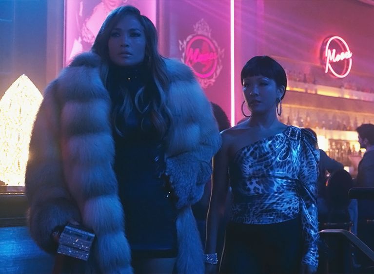 A screenshot from the movie Hustlers featuring Jennifer Lopez and Constance Wu