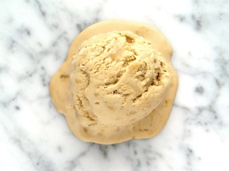 a scoop of a banoffee ice cream on a marble countertop