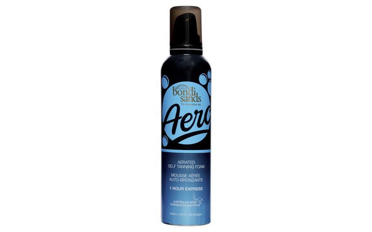 How to use self tanner: a bottle of Bondi Sands self-tanner on white background.
