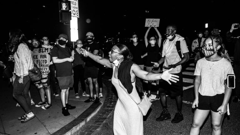 Marchers in Washington express their anger and outrage over George Floyd’s death to police.