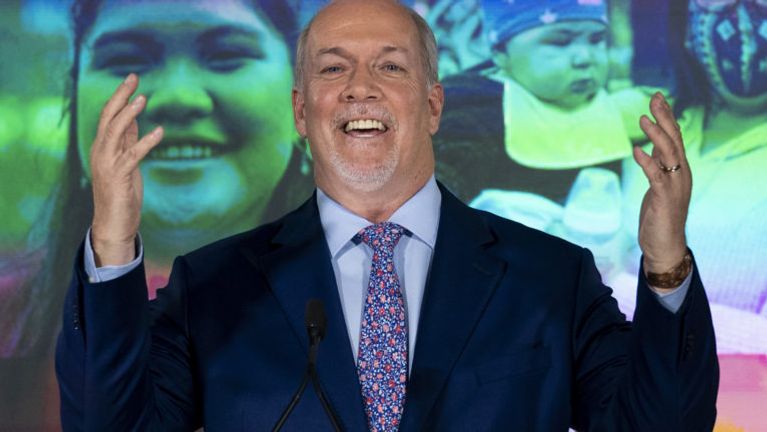 Horgan celebrates his B.C. election win on Saturday. (Jonathan Hayward/CP)