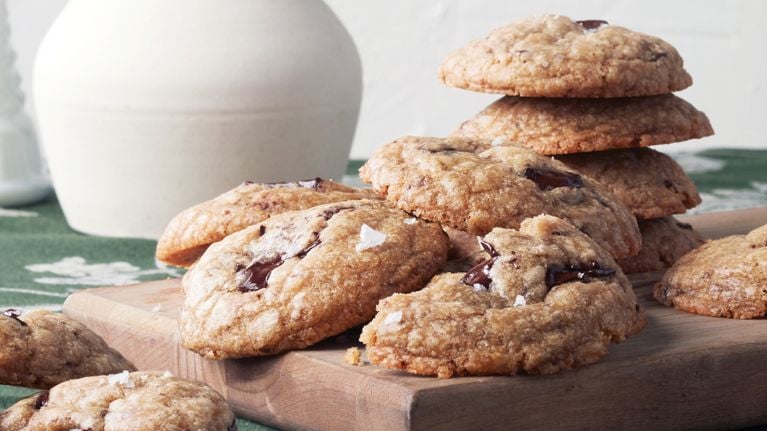 A plate of vegan chocolate chip cookies for a plant-based recipe