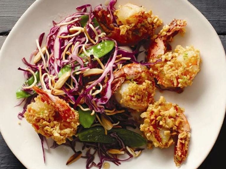 super crunch shrimp with veggies in a white bowl