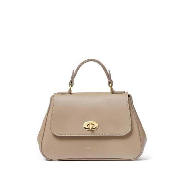 A photo of the bag. Kate carried an on-trend mini bag. She rounded out her look with the Mini Holly in Taupe Atlantic by Tusting