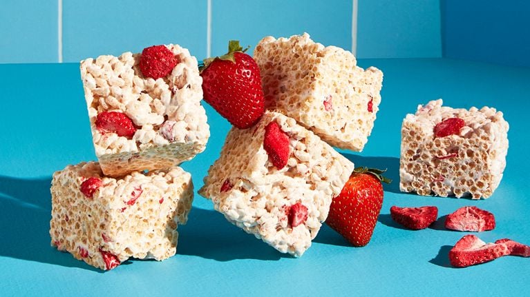 Vegan crispy rice berry squares, rice crispie squares with strawberries embedded in them