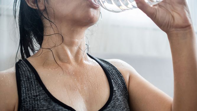 How To Wash Your Workout Clothes (And Actually Get Rid Of The Stink)