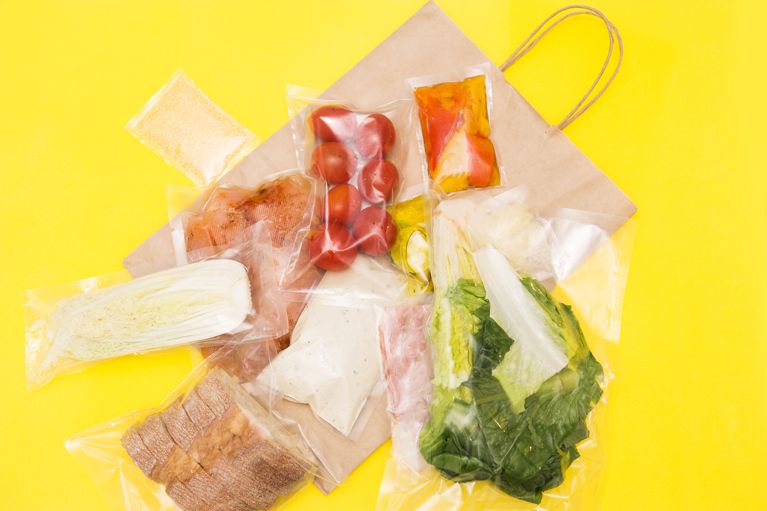 Packaged ingredients for a meal kit salad, in a post about meal kits canada.