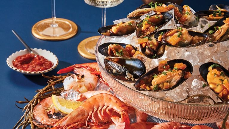mussels, shrimps and langoustines with cups of sauce