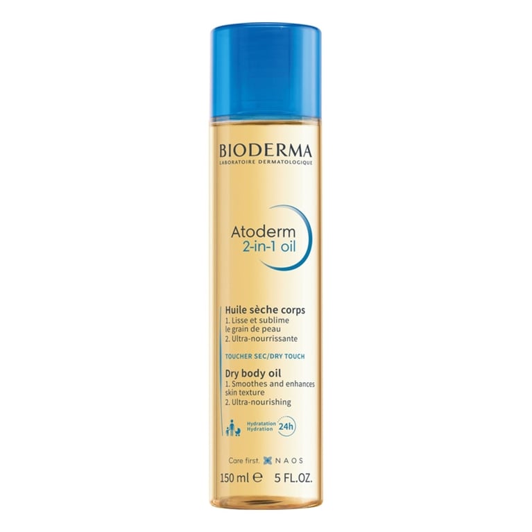 A bottle of Bioderma Atoderm 2-in-1 Dry Body Oil for an article about dry brushing.