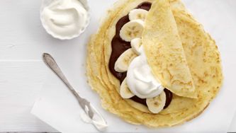 French Crepes With Nutella, Bananas And Whipped Cream