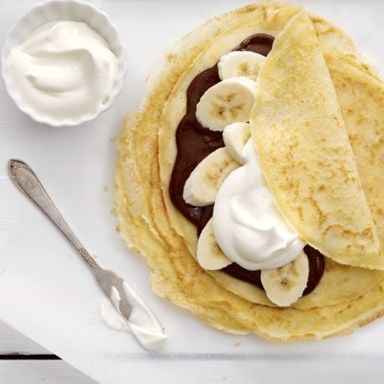 French Crepes With Nutella, Bananas And Whipped Cream