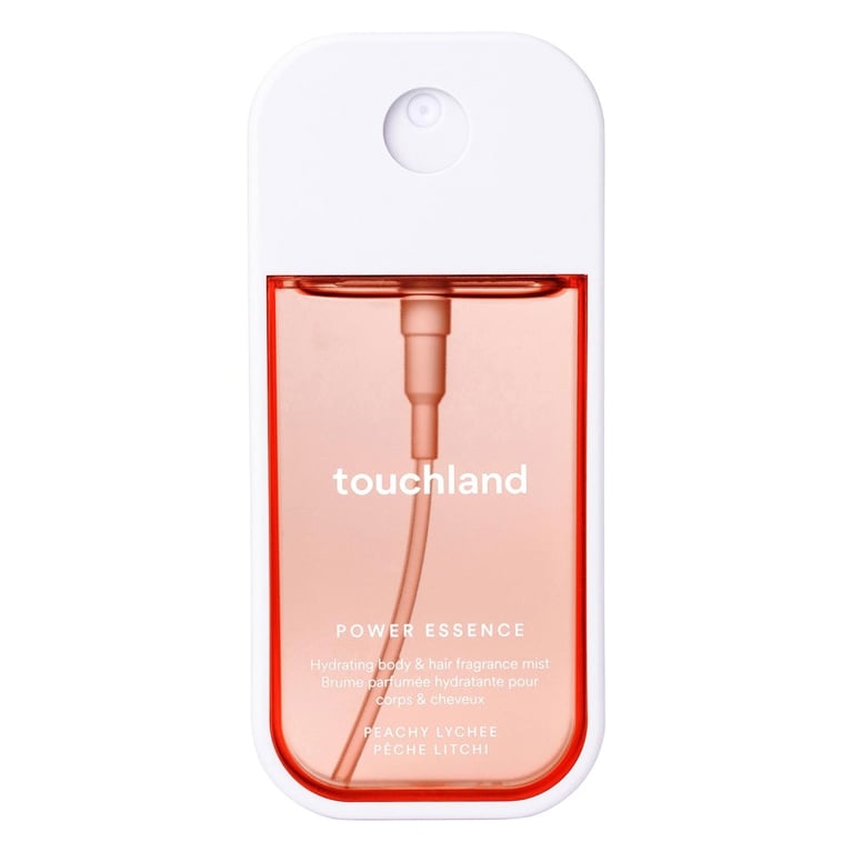 A bottle of Touchland Power Essence Body Mist in Peachy Lychee for an article about the best body mists to shop for summer.