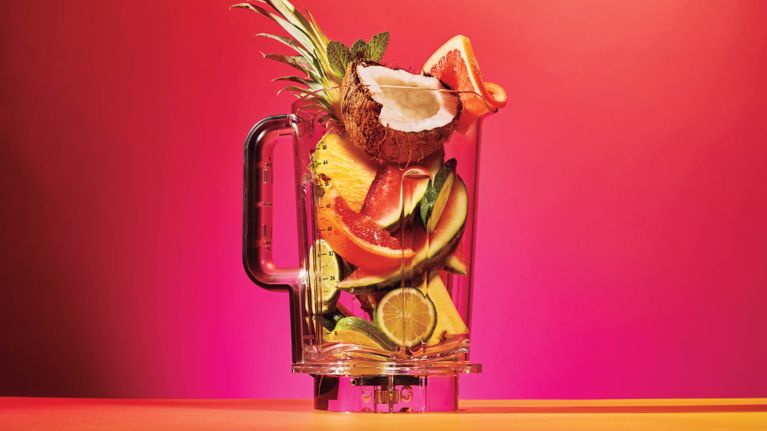 Three models of blenders on a tie-dyed background.