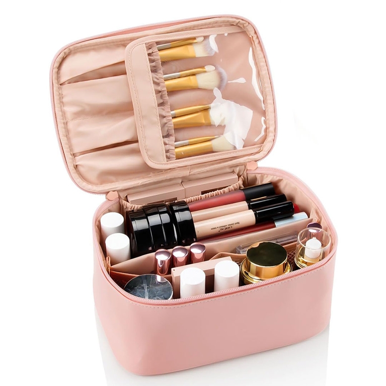 A pink makeup case, one of the best makeup bags to shop for 2025.