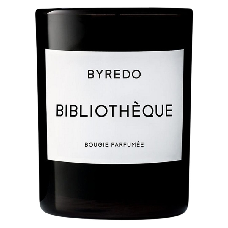 A black Byredo candle with a white label, for a post about the best gifts for book lovers.
