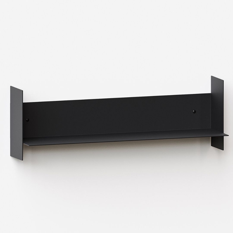 A black metal wall shelf for books, for a post about the best gifts for book lovers.