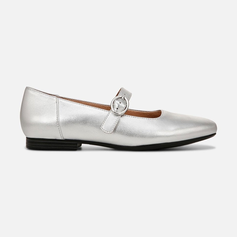 A pair of silver Naturalizer ballet flats for an article about the silver shoe trend.