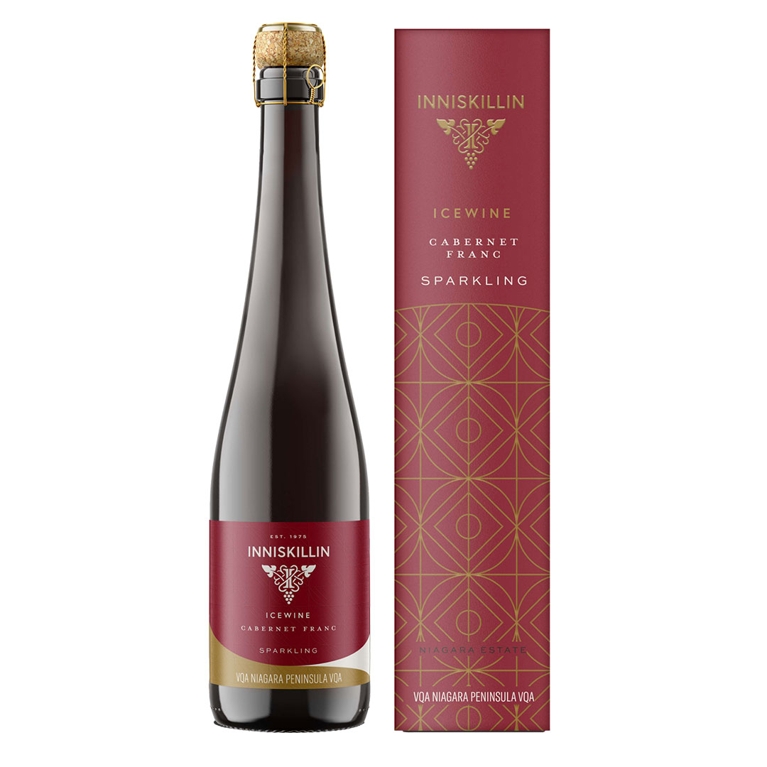 A red box of Inniskillin Sparkling Cab Franc Icewine beside a small bottle with a red label