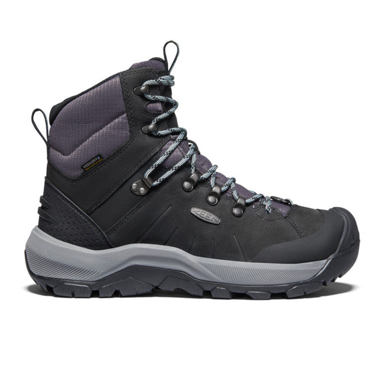A pair of grey and black Keen Revel warm winter boots seen from the side for an article about warm stylish winter boots.
