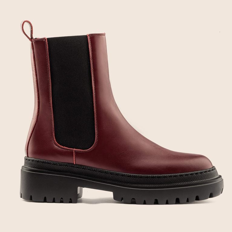 A pair of burgundy Maguire Cortina warm winter boots seen from the side for an article about warm stylish winter boots.