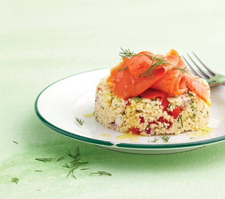couscous pilau with smoked salmon on a plate for a post on an easy no cook summer couscous pilaf with smoked salmon recipe