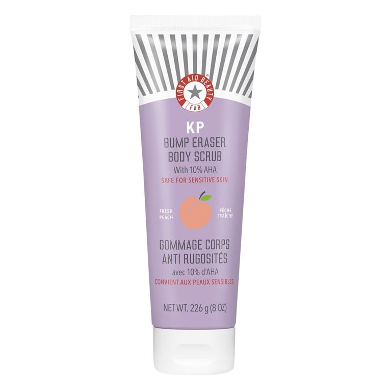 A tube of First Aid Beauty KP Bump Eraser Body Scrub with 10% AHA for an article about how to treat keratosis pilaris.