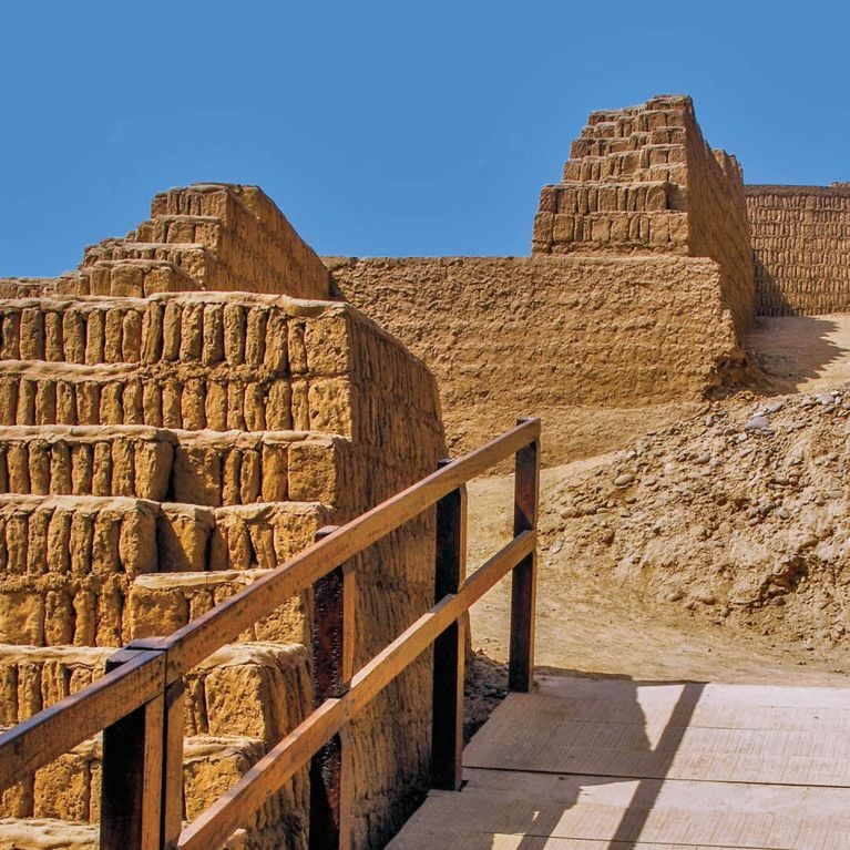 An adobe and clay multi-level pyramid in a post about lima peru