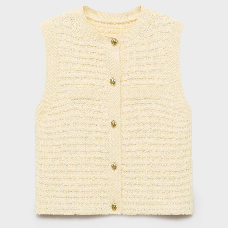 A butter yellow top vest top from Mango for an article about how to wear the butter yellow fashion trend.
