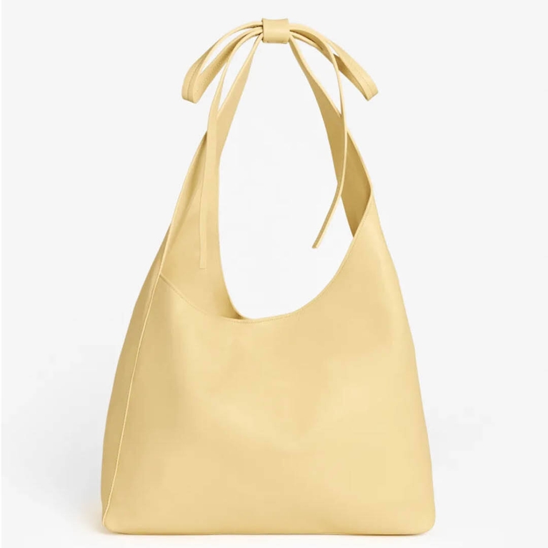 A Vittoria bag from Reformation for an article about how to wear the butter yellow fashion trend.