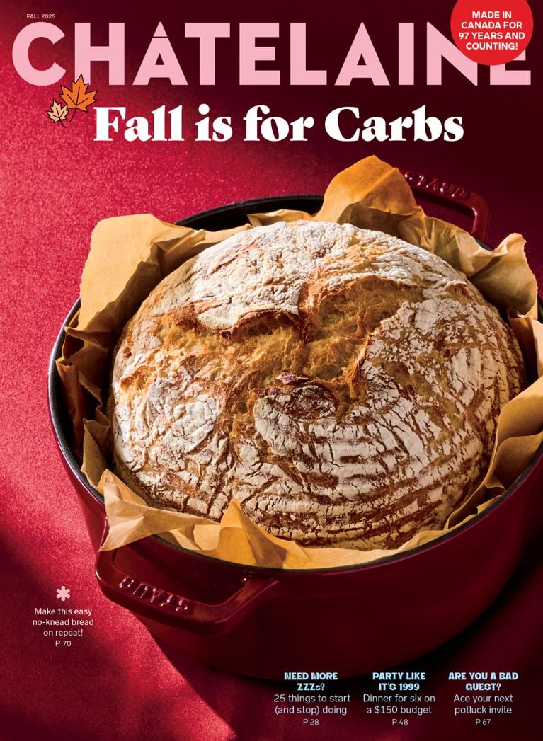 the cover of Chatelaine's fall 2025 issue, with a loaf of fresh baked bread in a cast-iron staub dutch oven and the words "fall is for carbs"