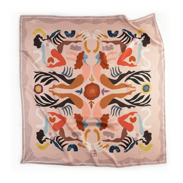 A silk scarf by artist Dora Nola for an article about how to protect your hair from sun damage in the summer.